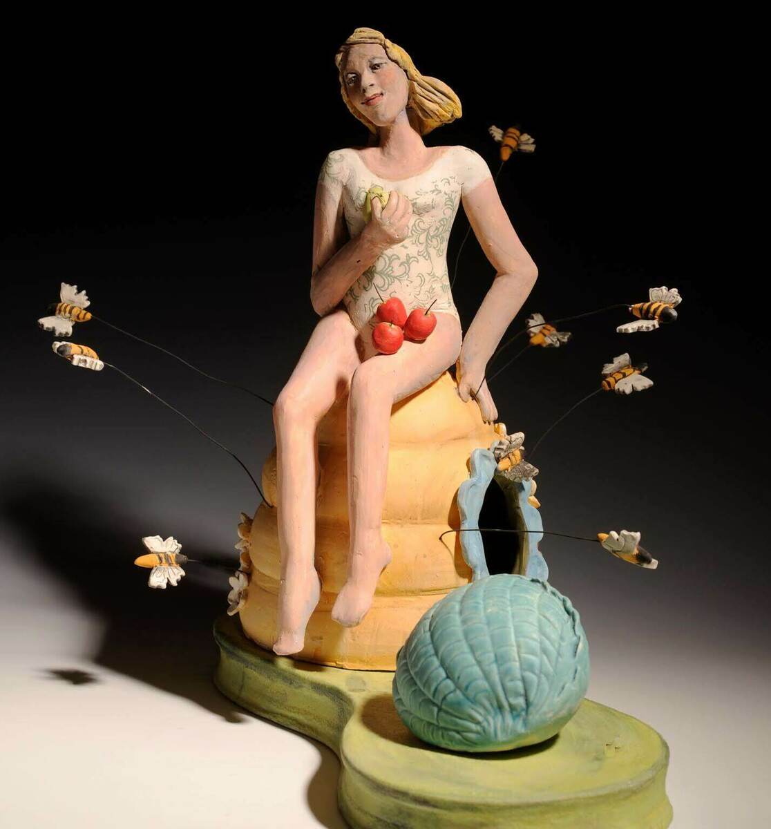 THE HUM OF THE BEES IS THE VOICE OF THE GARDEN